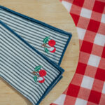 PIKNIK - set de 2 serviettes de table bleues